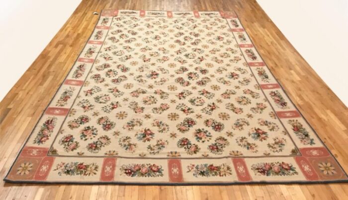 1900 antique continental needlepoint rug in large size w repeating design 1887