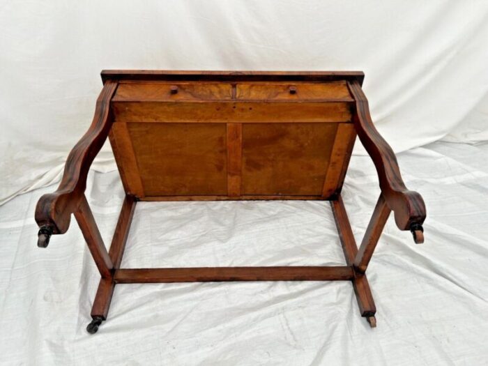 1900s antique desk american empire on caster wheels two drawers flame mahogany veneer 4298