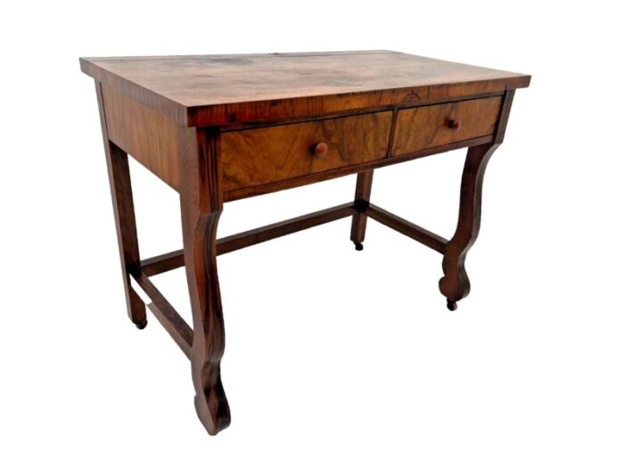 1900s antique desk american empire on caster wheels two drawers flame mahogany veneer 6127