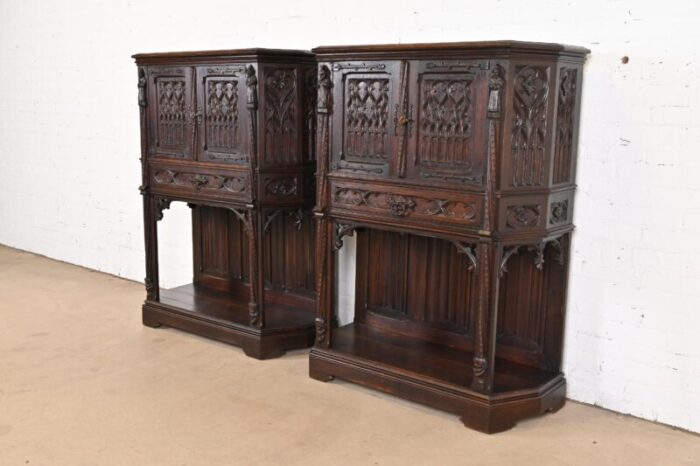 19th century belgian gothic revival carved dark oak bar cabinets pair 0985