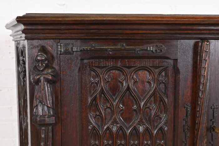 19th century belgian gothic revival carved dark oak bar cabinets pair 9746