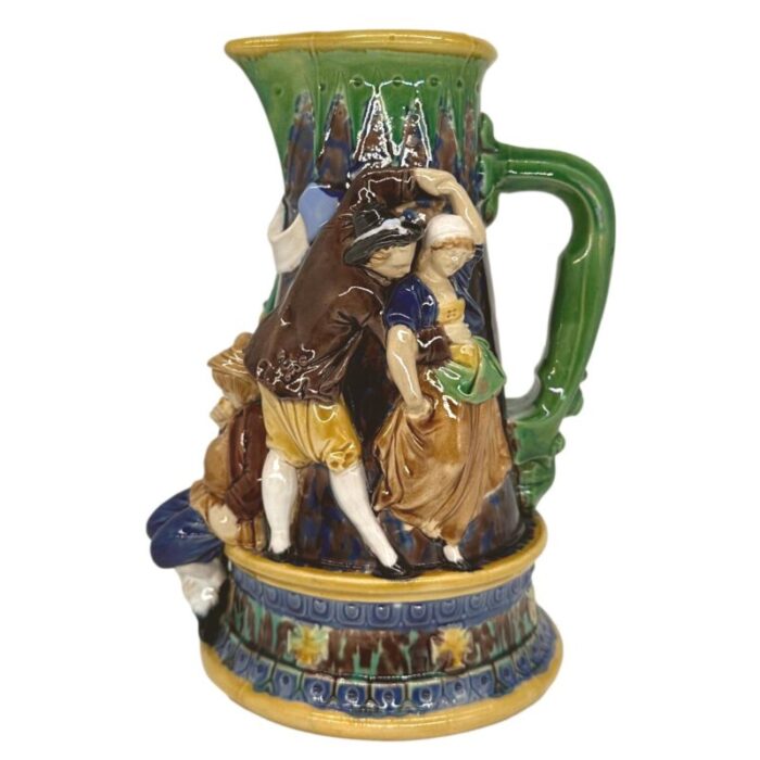 a minton majolica ale jug with five revelers in medieval dress dated 1862 7199