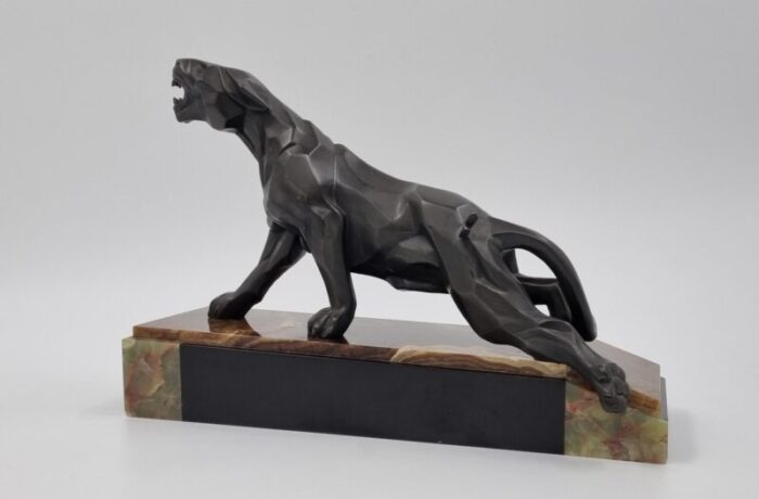 a notari art deco panther 1920s metal on onyx base 1886