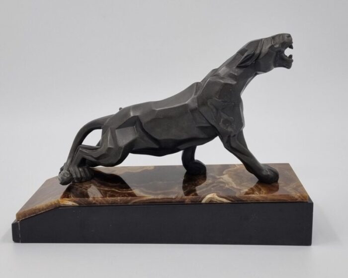 a notari art deco panther 1920s metal on onyx base 4230