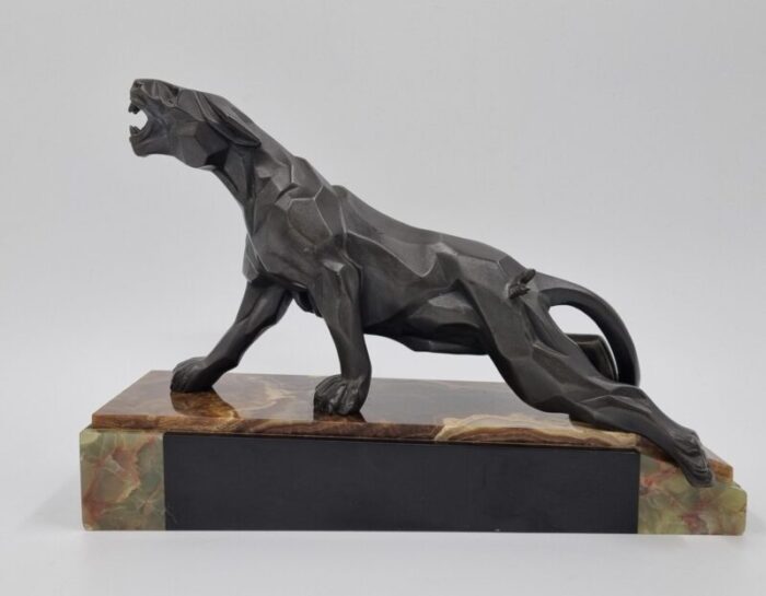 a notari art deco panther 1920s metal on onyx base 6234