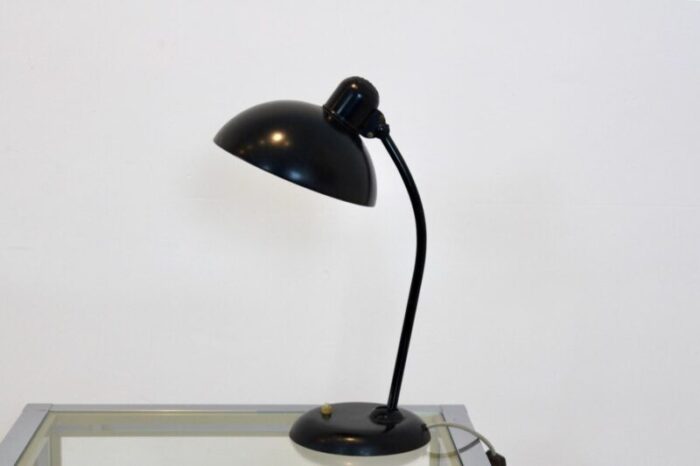 adjustable black steel table lamp attributed to christian dell for kaiser idell 1930s 4248