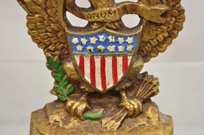 antique patriotic cast iron figural gold american flag and eagle painted door stop 2850