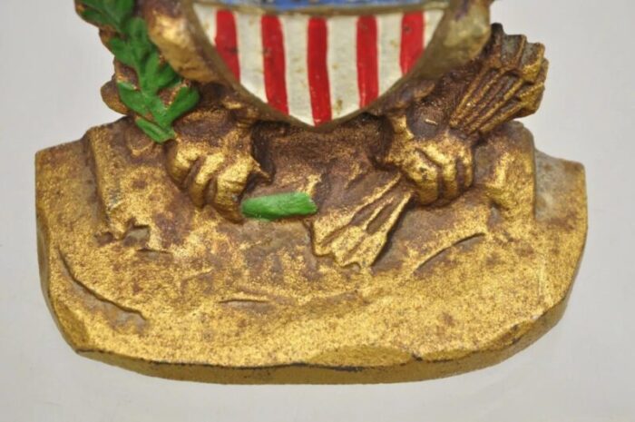 antique patriotic cast iron figural gold american flag and eagle painted door stop 4845