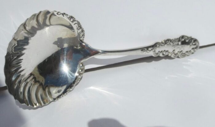 antique sterling silver serving spoon circa 1915 7635