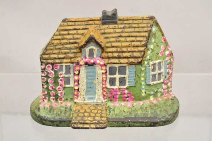 antique victorian cast iron painted green and pink cottage house door stop 4842