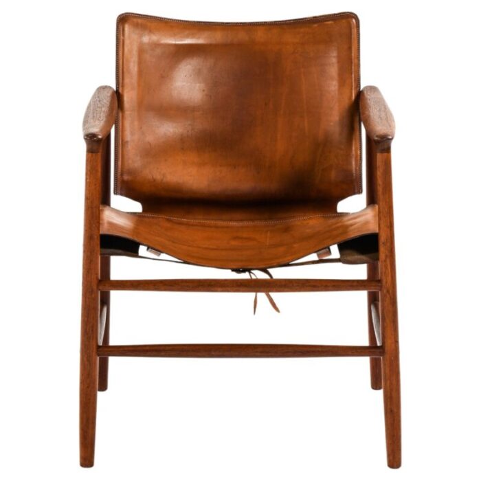 armchair in teak and leather attributed to kai lyngfeldt larsen 1957 7294