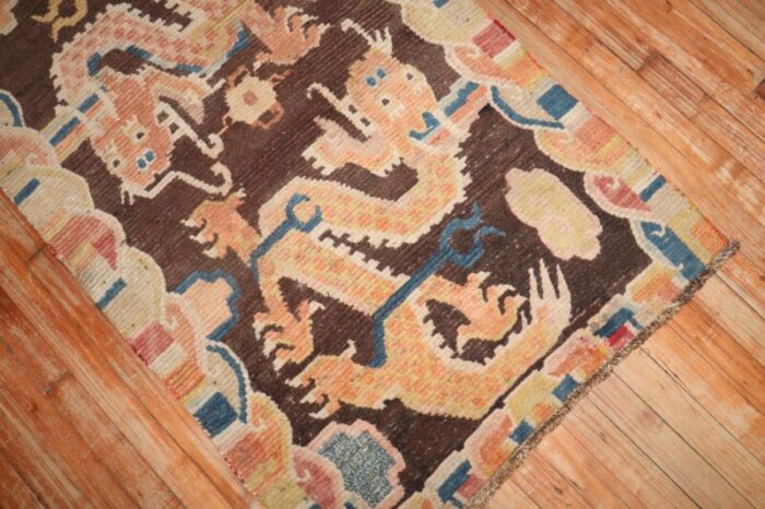 brown dragon early 20th century tibetan rug 29 x 41 0107