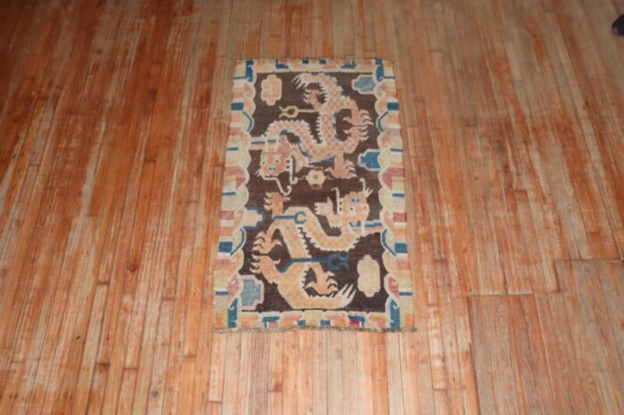 brown dragon early 20th century tibetan rug 29 x 41 2539