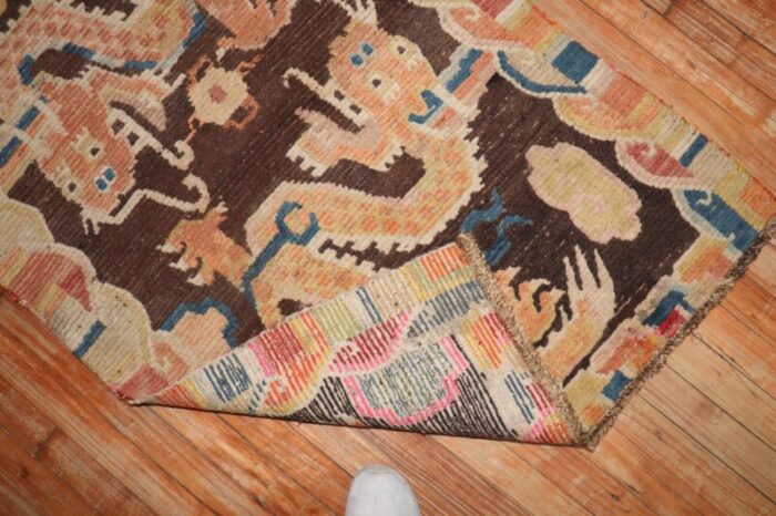 brown dragon early 20th century tibetan rug 29 x 41 4191