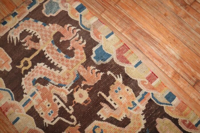 brown dragon early 20th century tibetan rug 29 x 41 7689