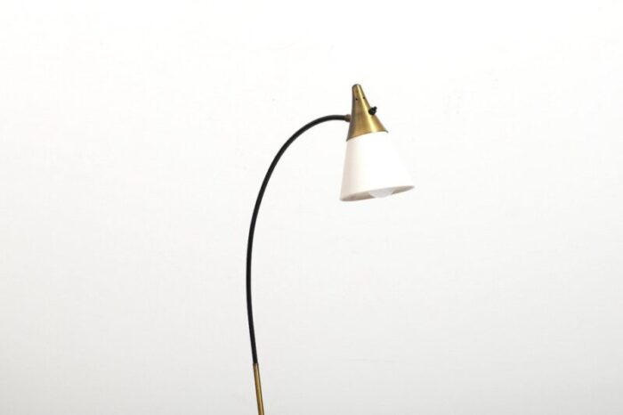 floor lamp in steel and brass by louis kalff 1950s 2