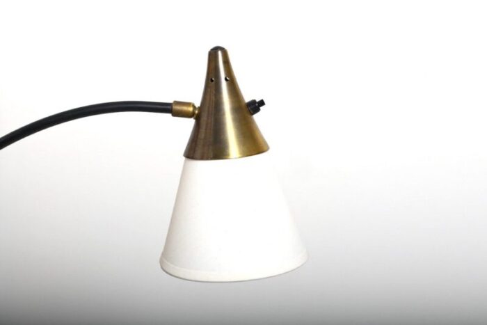 floor lamp in steel and brass by louis kalff 1950s 7