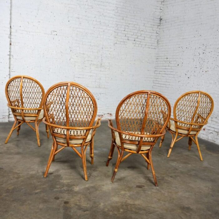 late 20th century coastal island style or hollywood regency balloon back rattan dining chairs off white seats set of 4 2753