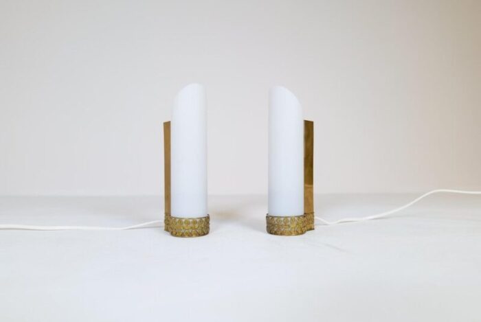 mid century modern brass and opaline wall lamps attributed to asea sweden set of 2 2