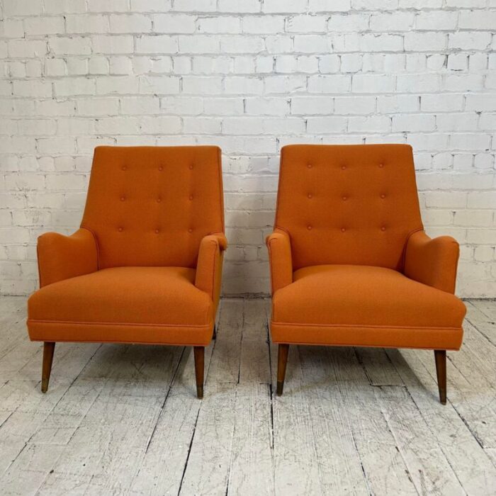 reupholstered pair of orange mid century modern lounge chairs 1835