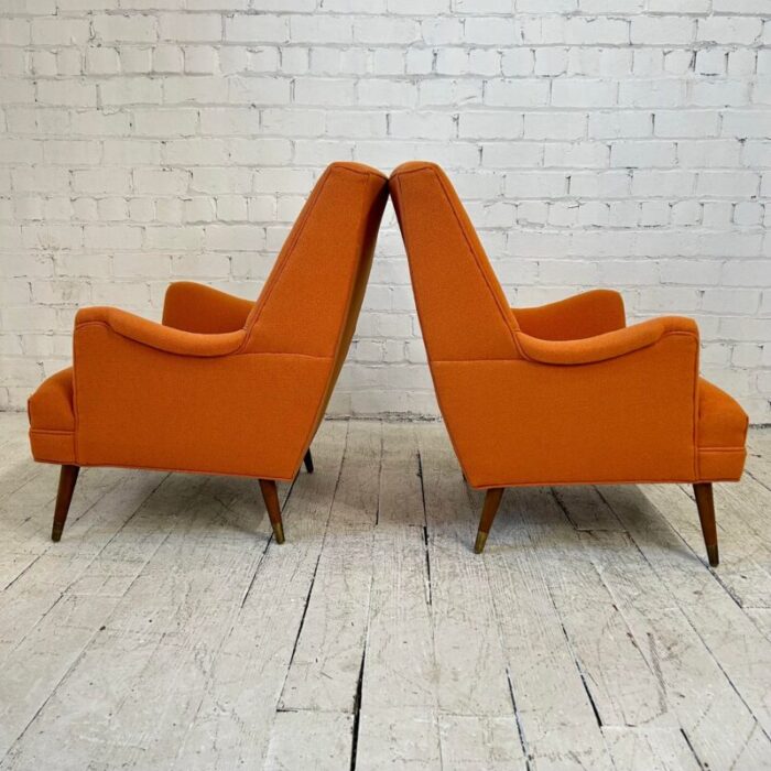 reupholstered pair of orange mid century modern lounge chairs 5485