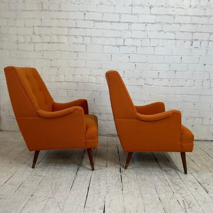 reupholstered pair of orange mid century modern lounge chairs 6212