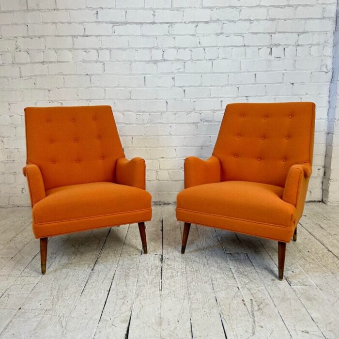 reupholstered pair of orange mid century modern lounge chairs 6215