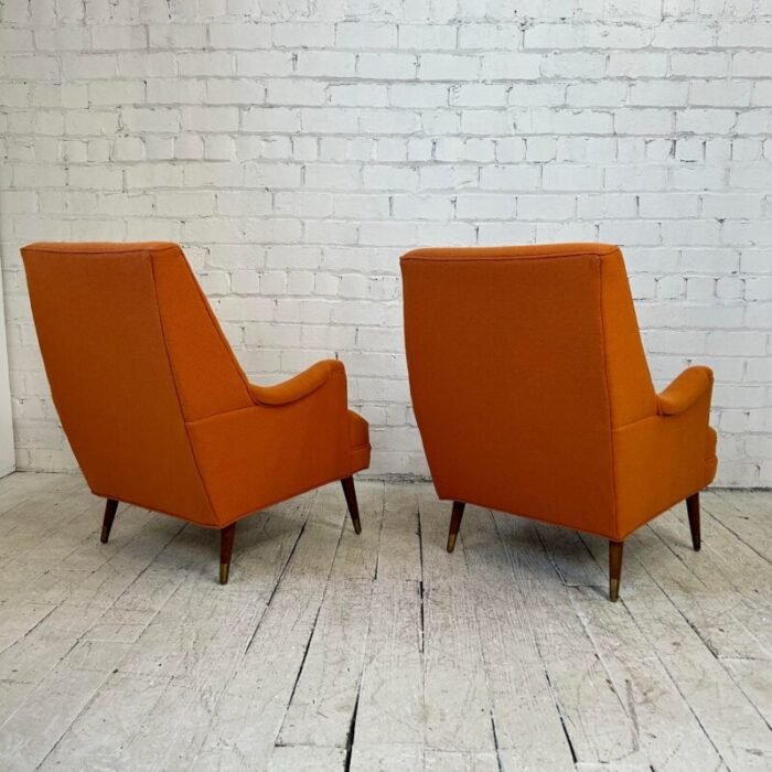 reupholstered pair of orange mid century modern lounge chairs 9341