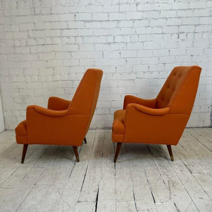 reupholstered pair of orange mid century modern lounge chairs 9691