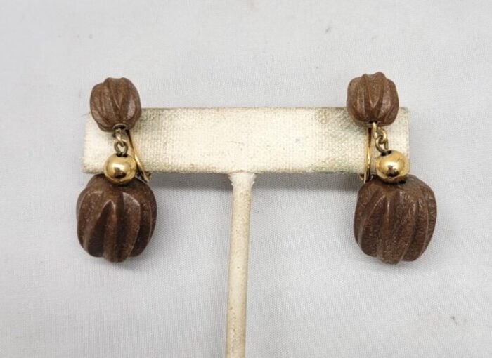 vintage 1960s signed napier goldtone wood carved beaded drop clip earrings 2 pieces 0221