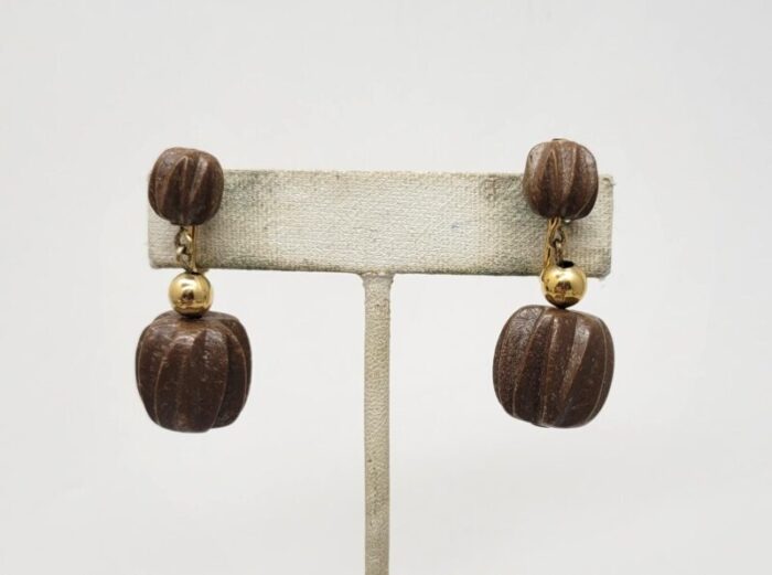 vintage 1960s signed napier goldtone wood carved beaded drop clip earrings 2 pieces 6852