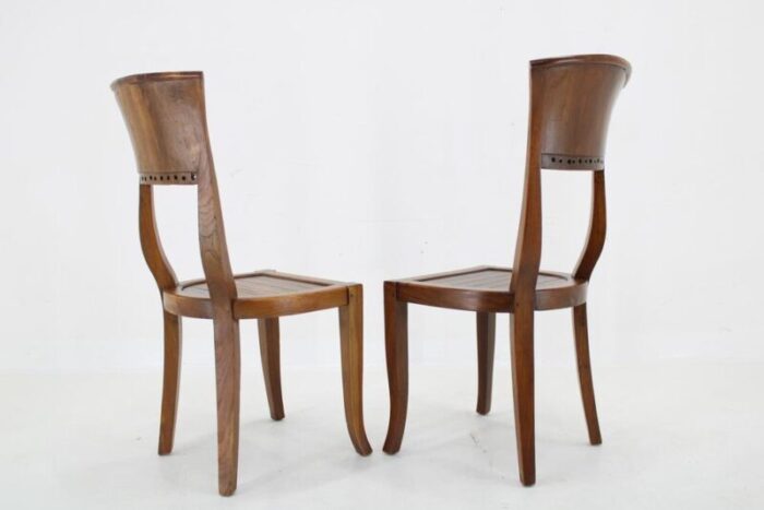 vintage teak chairs 1980s set of 2 2711